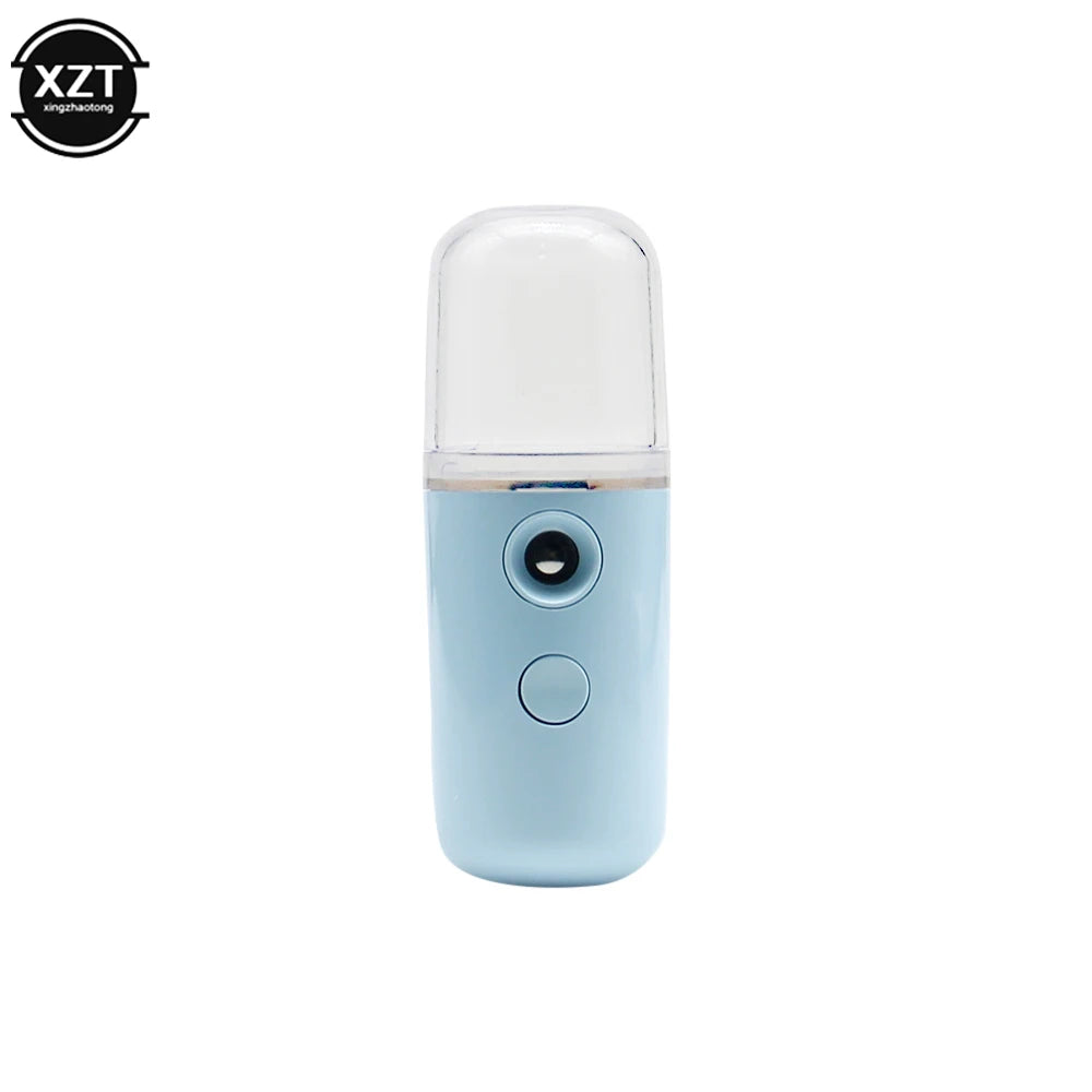 Portable device with a white top and blue body on a white background, featuring the brand 'XZT'.