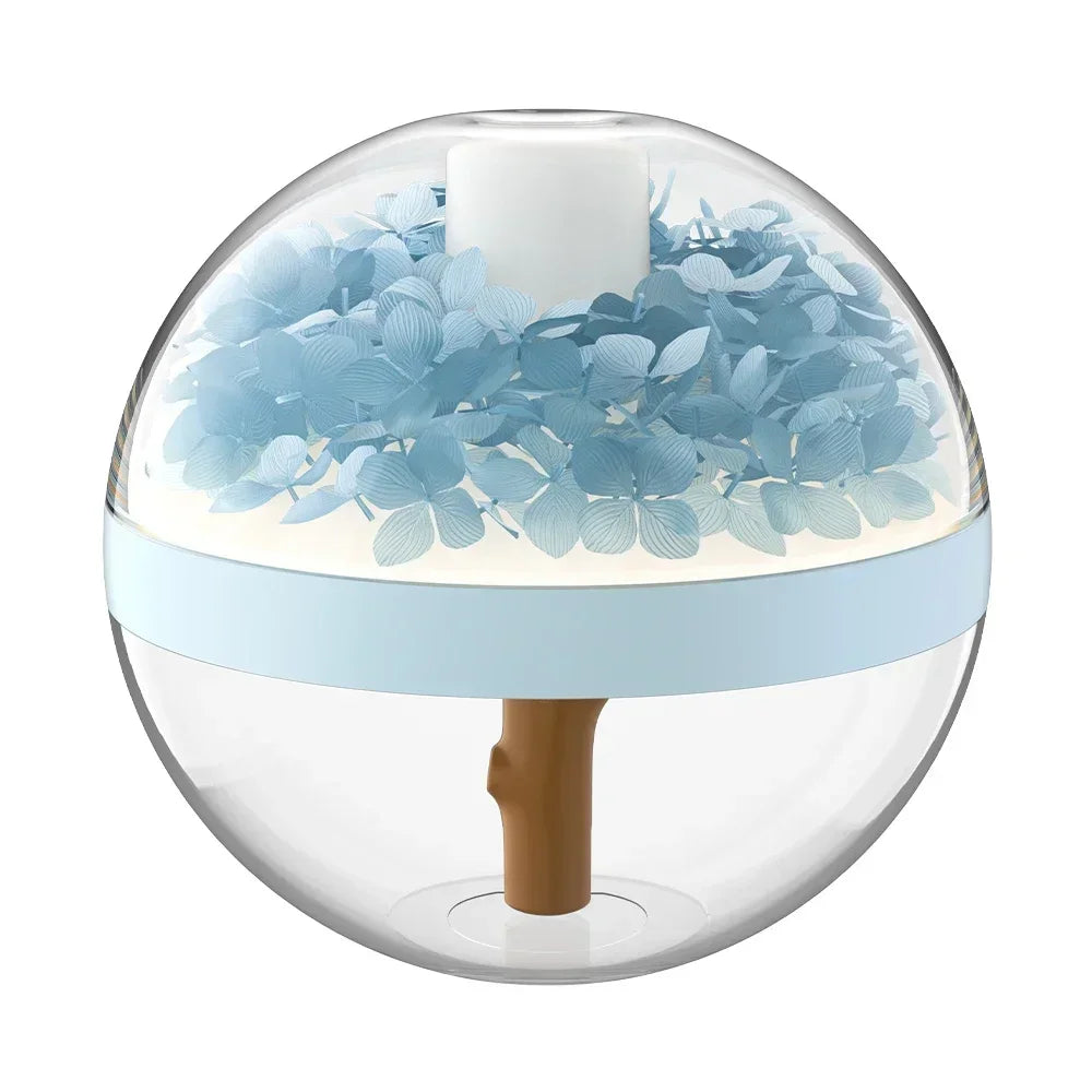 Round decorative item with blue floral design inside a clear sphere on a white background