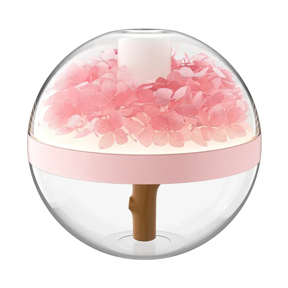Clear spherical container with pink floral interior on a white background