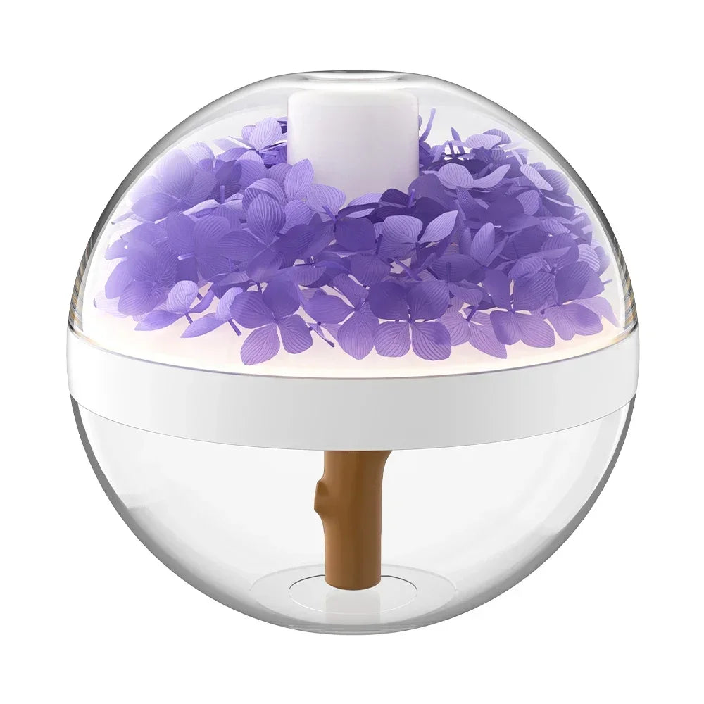 Clear spherical container with purple flowers and a wooden stick on a white background