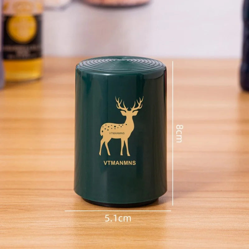 Green automatic beer opener with deer print showing size 8cm by 5.1cm