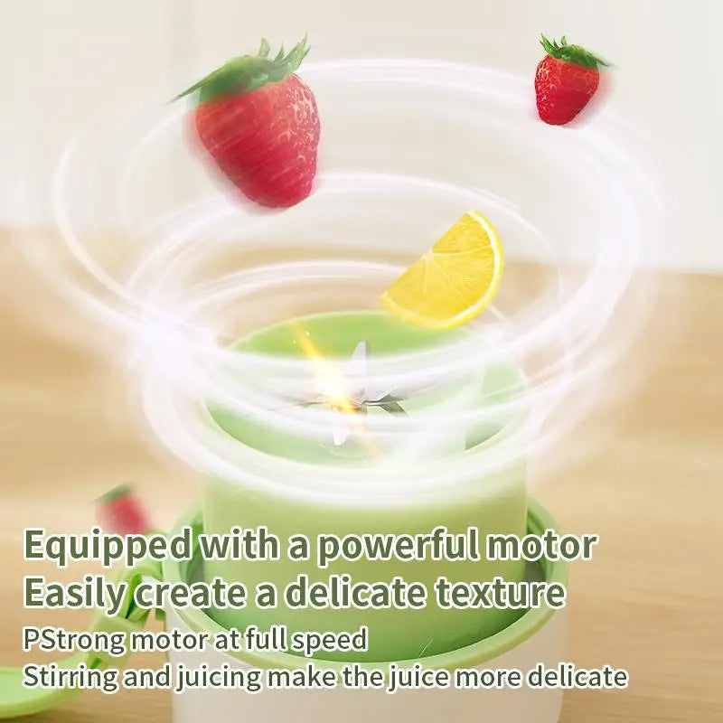 Juicer with strawberries and lemon on a light background