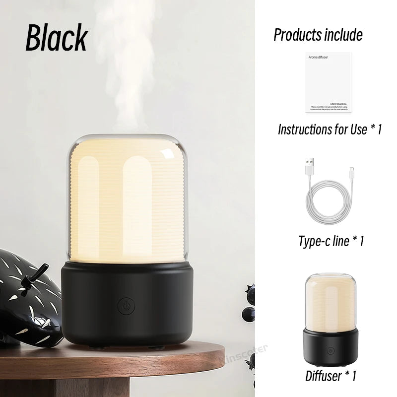 Black LED aroma diffuser emitting soft mist, ideal for nighttime relaxation.
