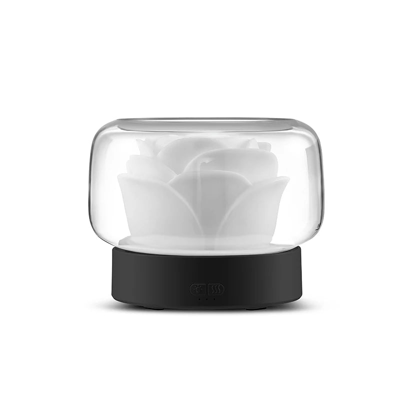 Minimalist black flower-inspired aroma diffuser with elegant design.