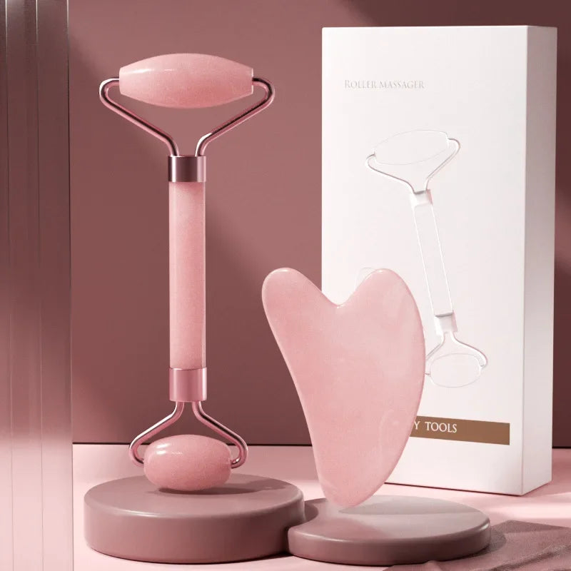 Luxurious pink jade roller with gua sha tool for facial treatment