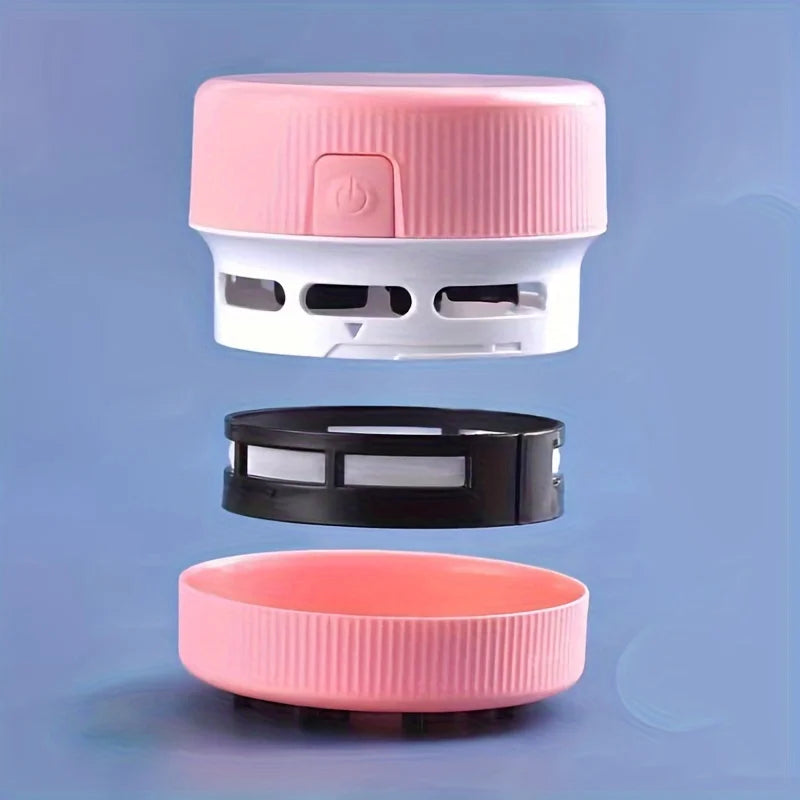 Pink and white container with a black component on a blue background
