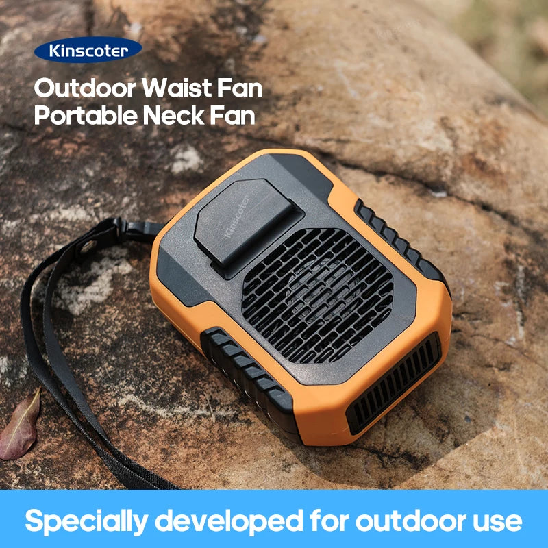 Compact and rugged outdoor waist and neck fan placed on a rock, perfect for outdoor use