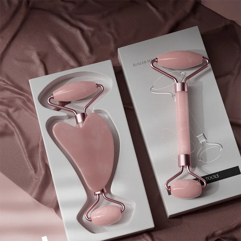 Pink facial roller and gua sha set with elegant box packaging for skincare and anti-aging massage