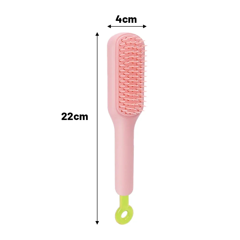 Pink telescopic hair comb showing size dimensions 22cm by 4cm