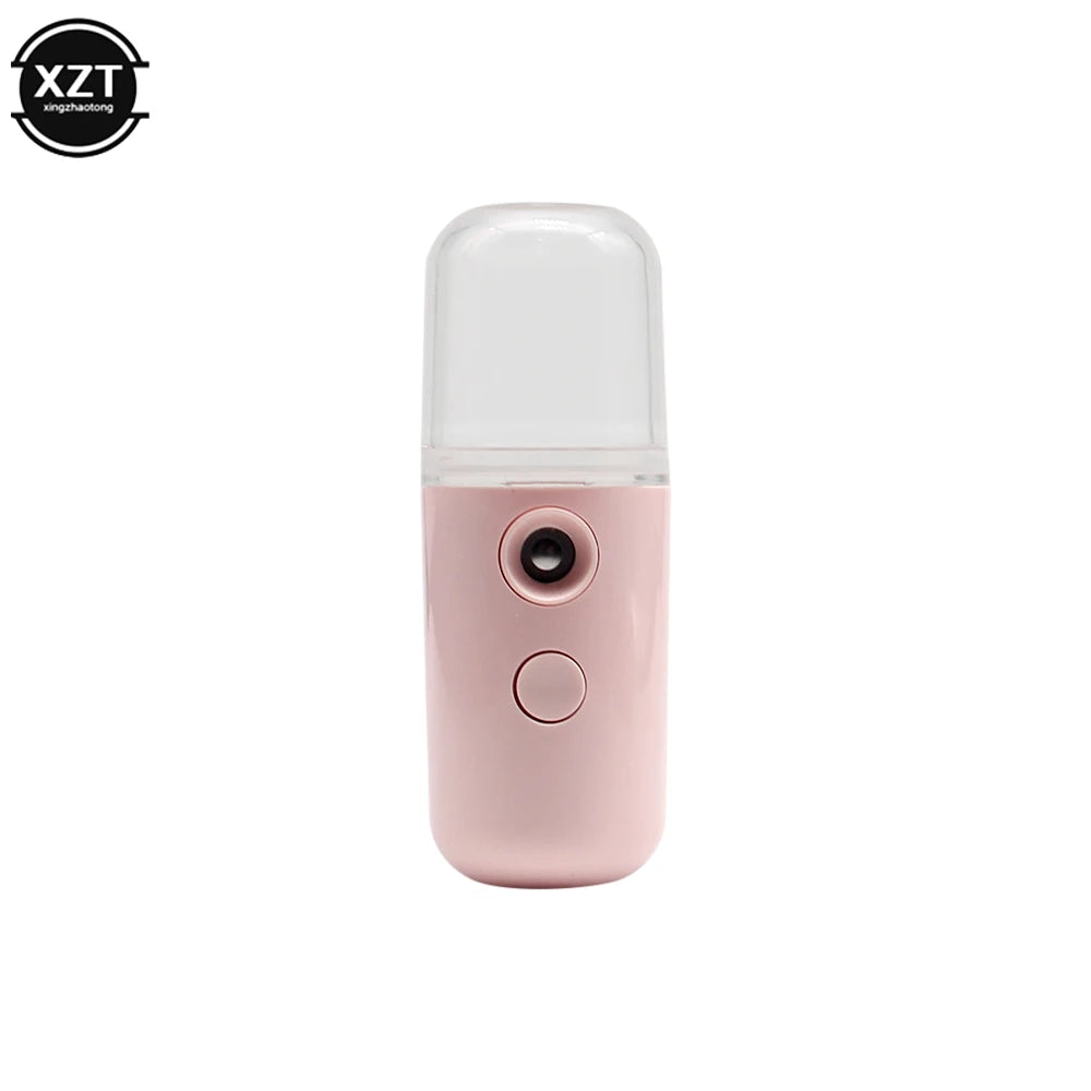 Pink and white handheld device on a white background with 'XZT' branding.