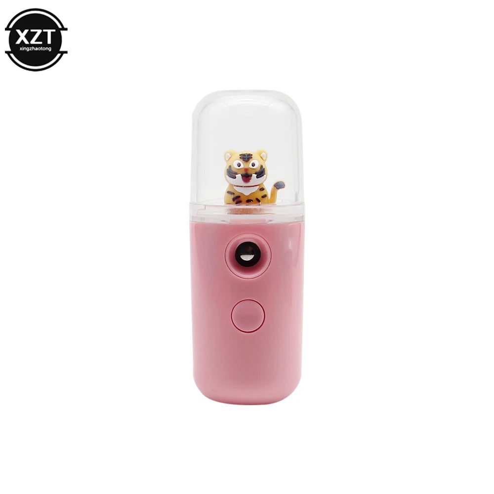 Pink handheld device with a cartoon tiger figure on a white background, featuring the brand 'XZT'.