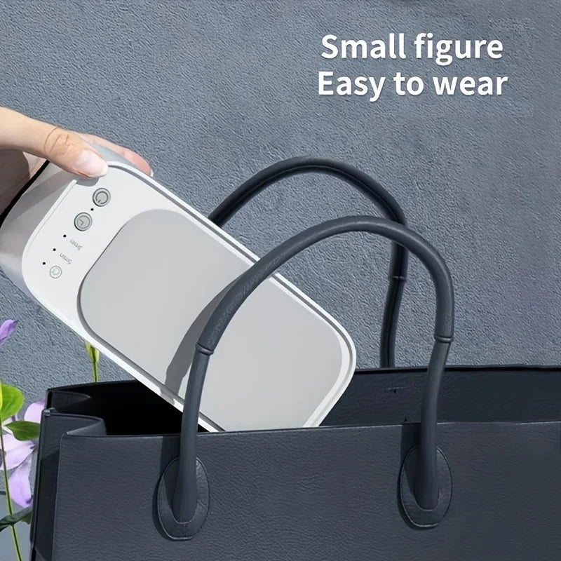 Portable ultrasonic cleaner being placed into a handbag for travel convenience.