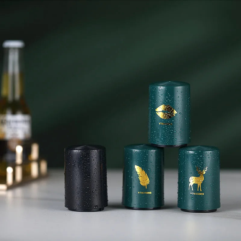 Group of stylish beer openers in green and black with gold print on dark background