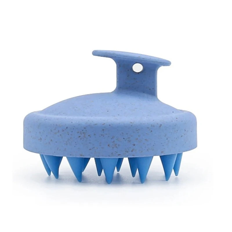 Blue Silicone Shampoo Brush shown from a side angle, highlighting its ergonomic design and soft bristles for scalp care.