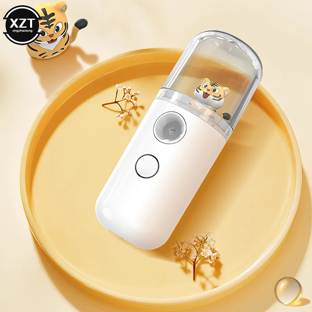 White handheld device with tiger design on a yellow plate, featuring the brand 'XZT'.