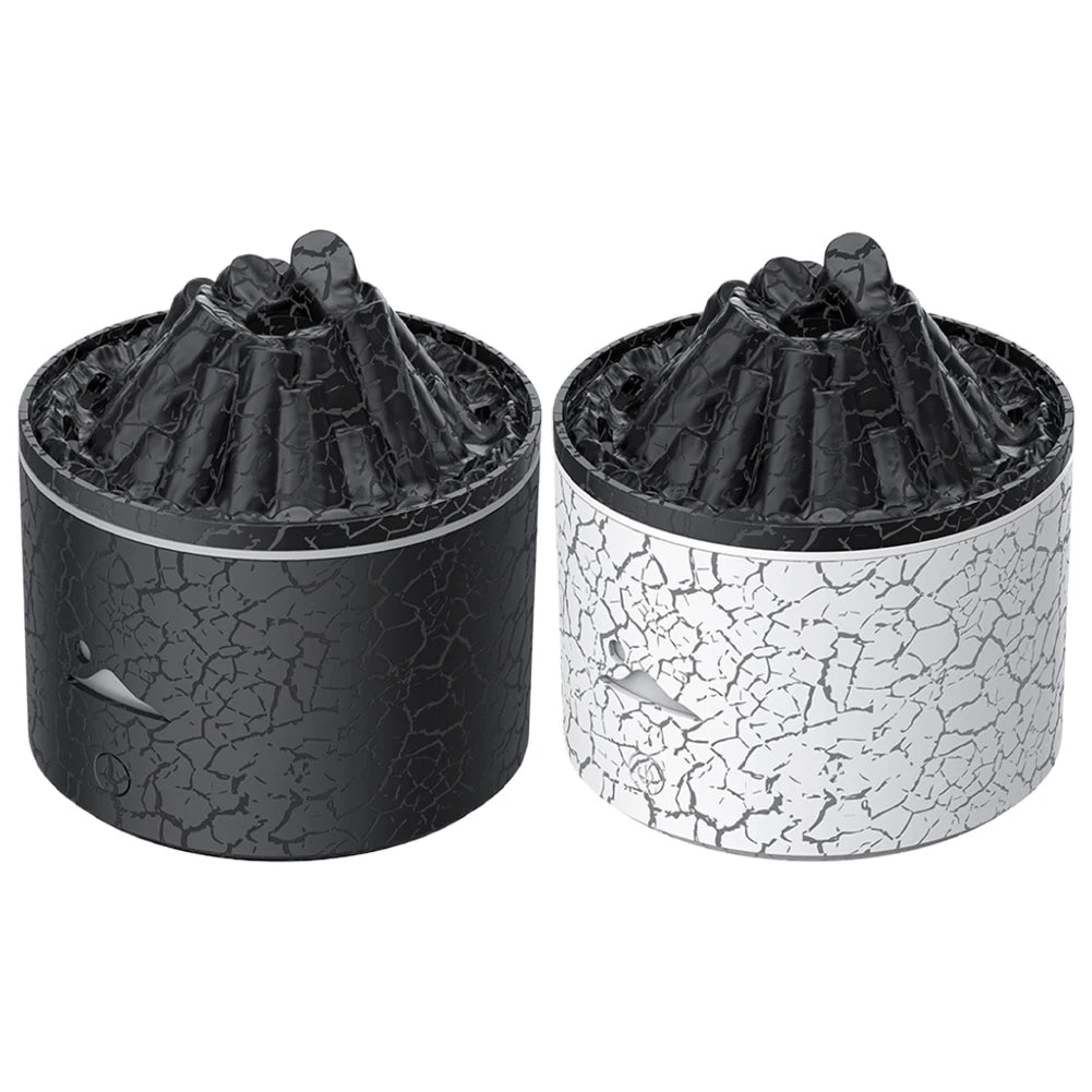 Top view of black and white volcano aroma diffusers with steam crater design and textured body.