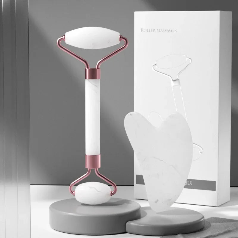 White jade facial roller and gua sha tool with elegant packaging