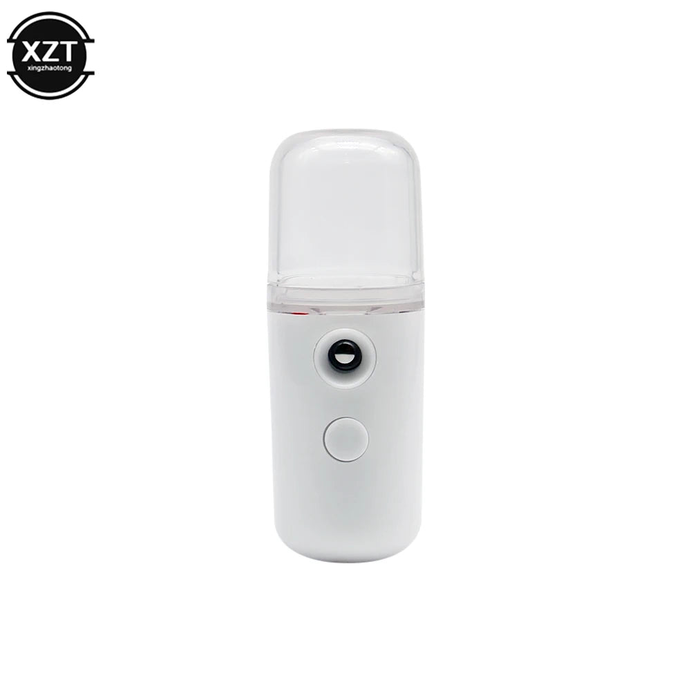 White handheld device with a clear top on a white background, featuring the brand 'XZT'.