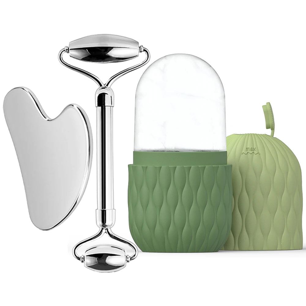 Beauty tool set with roller, gua sha tool, and green case on a white background