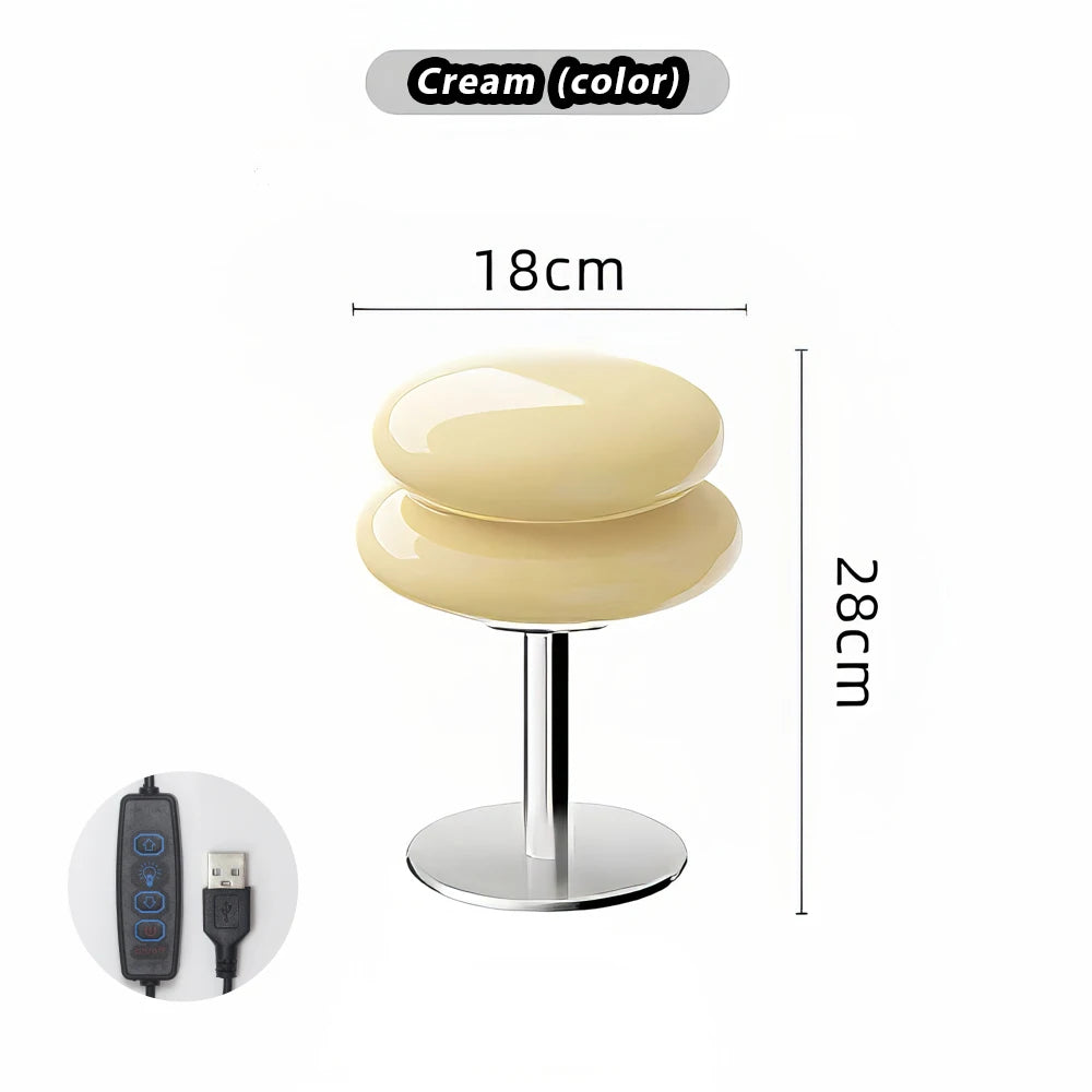 Cream-colored stool with dimensions and USB cable icon on a white background
