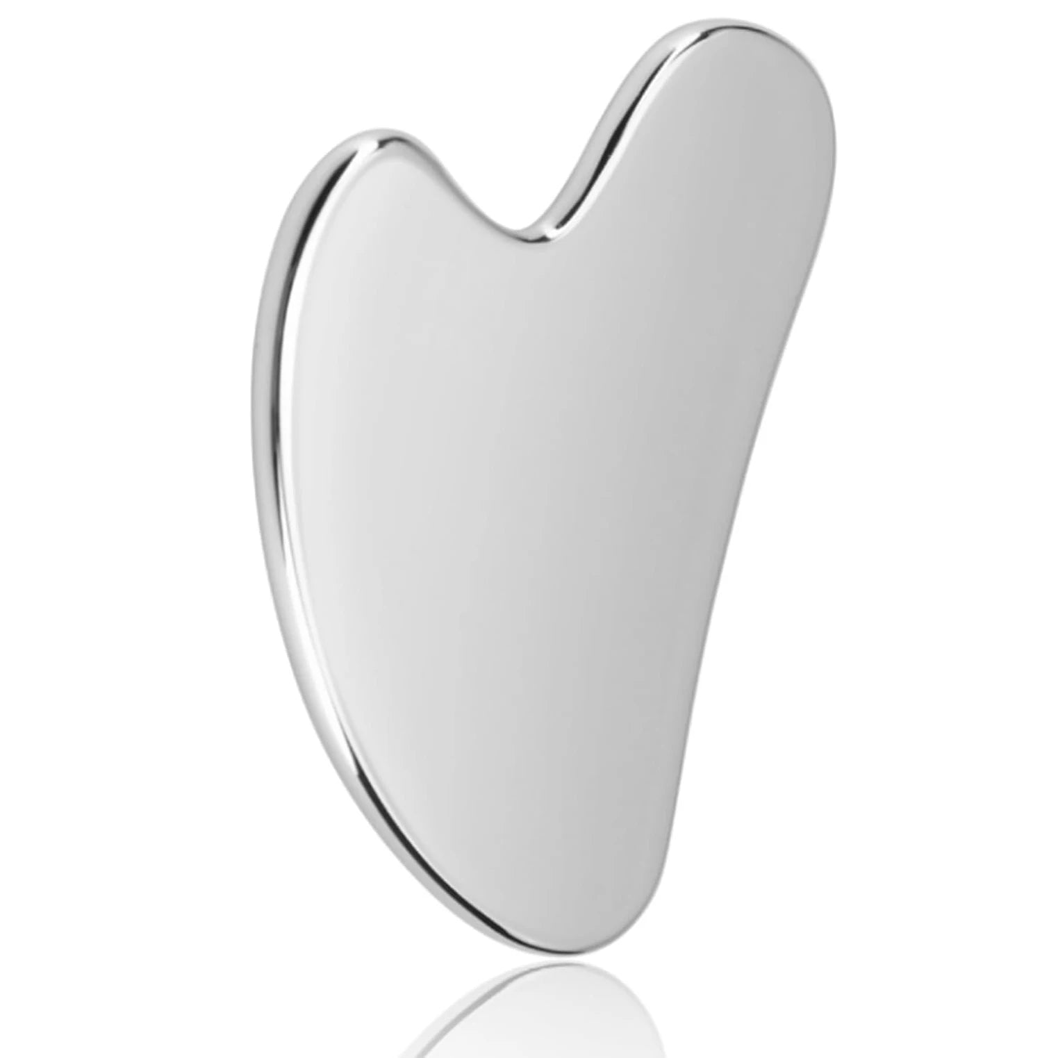 Silver gua sha tool on a white background