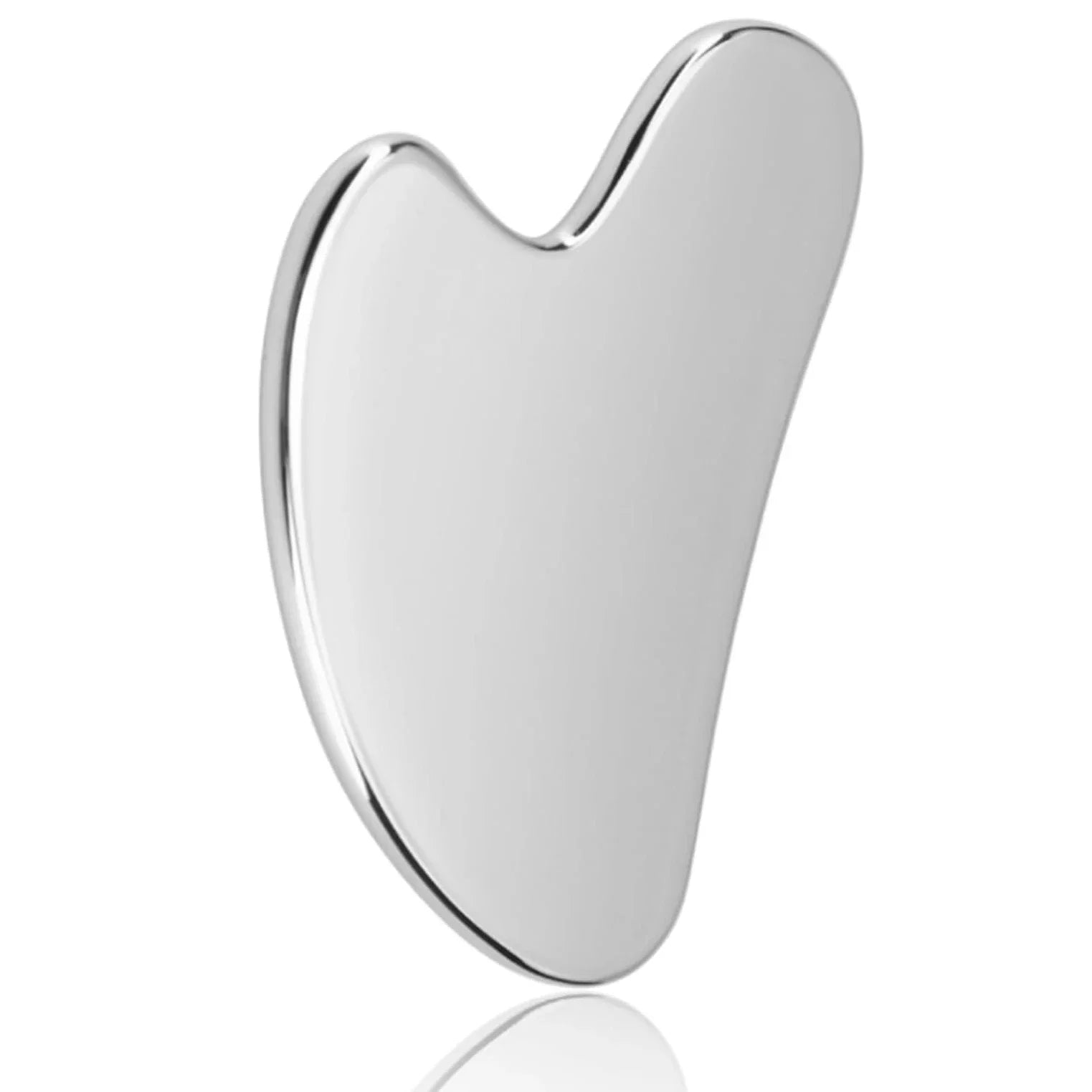 Silver gua sha tool on a white background