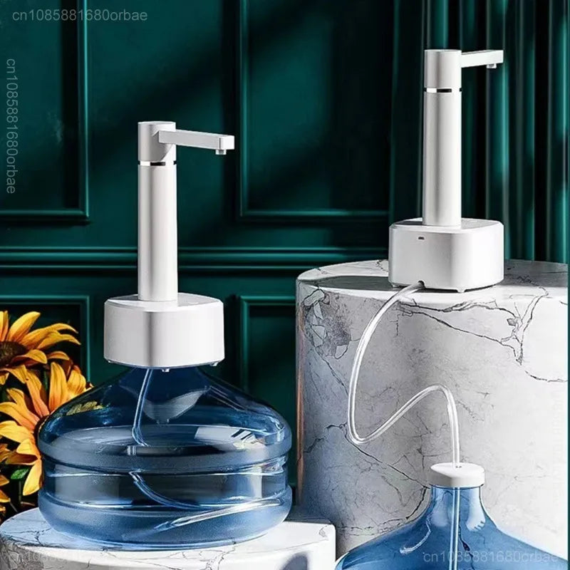 Two white 3-gear Smart Automatic Water Dispensers on large water jugs, placed on a marble table with flowers in the background.