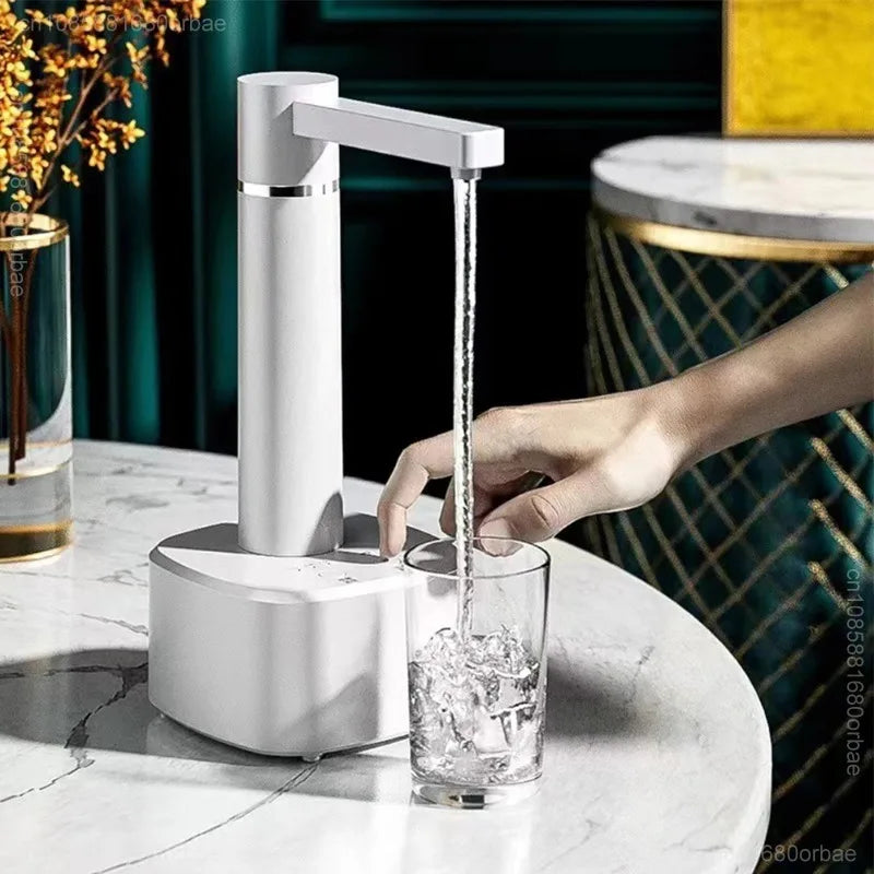 Hand using a white 3-gear Smart Automatic Water Dispenser to pour water into a glass with ice on a marble table with decor.
