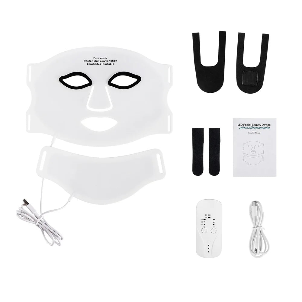 LED facial beauty device with mask, attachments, and power adapter on a white background